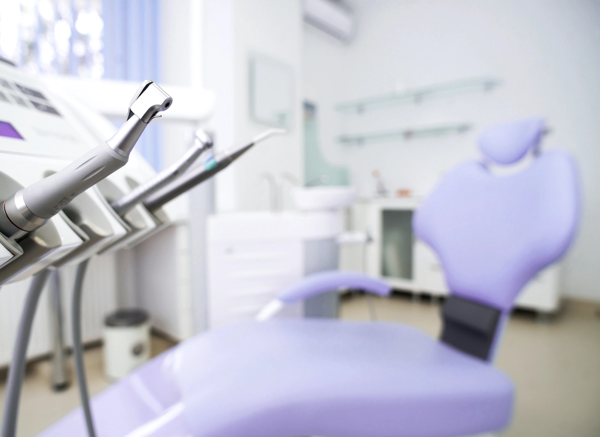 photo of dental office with purple chairs