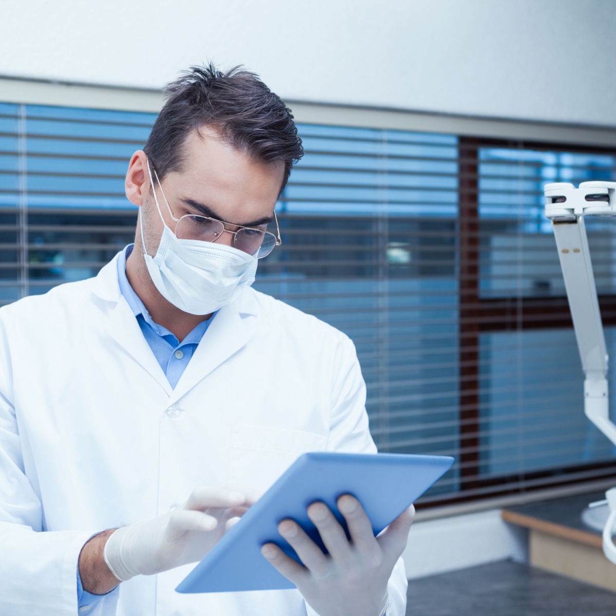 A dentist using the OrthoPhoto app